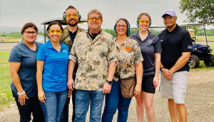 Team members at the Blue Cares Sporting Clay Shoot